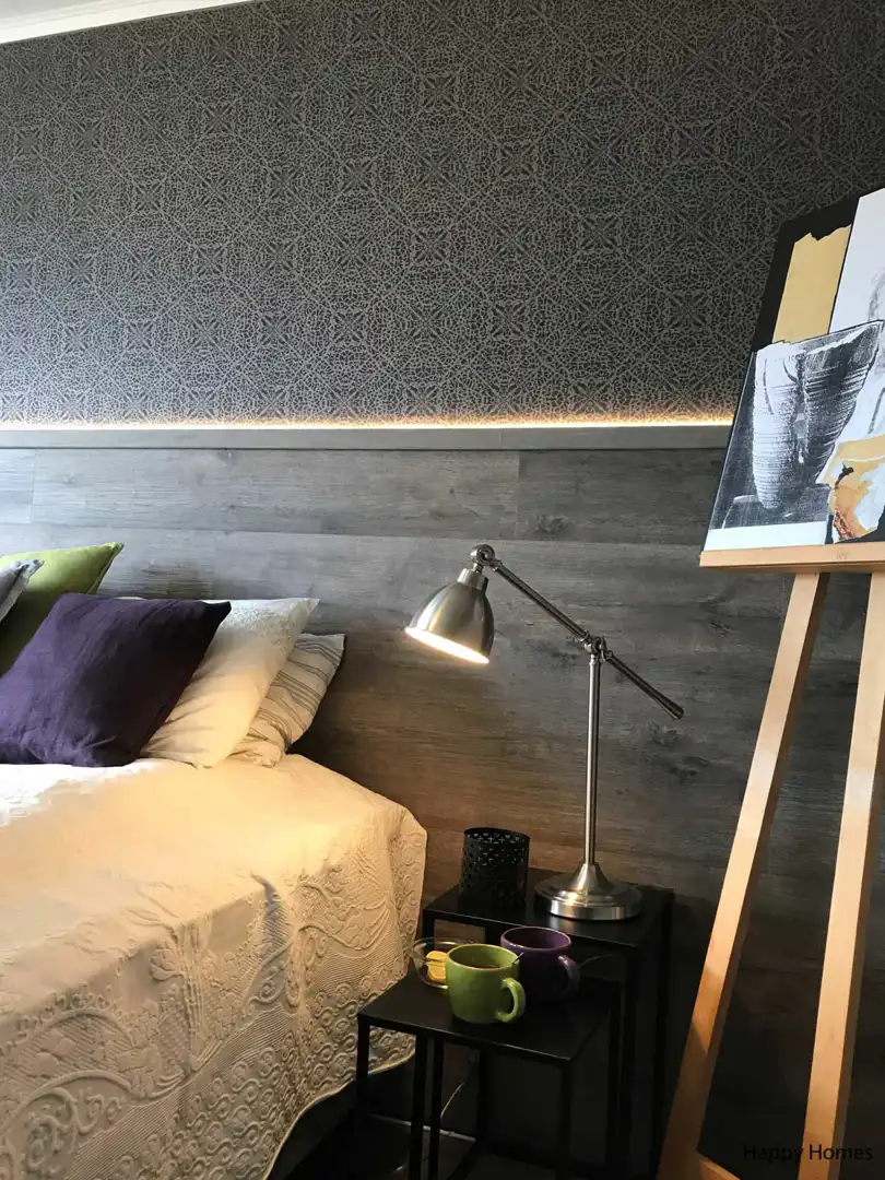 Lubt soverom med gulv som sengegavl